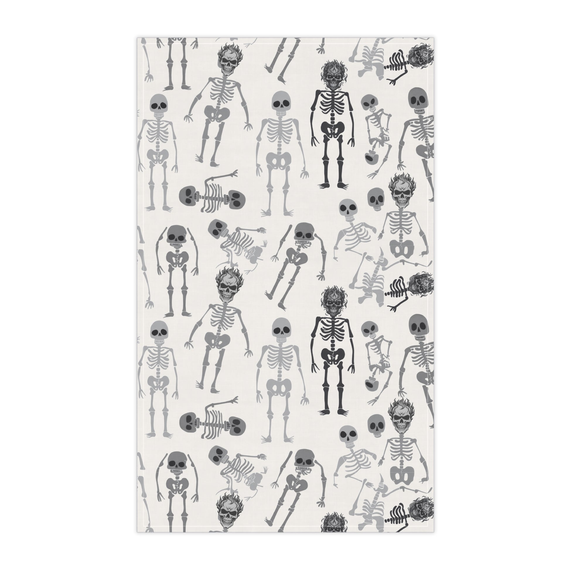 Skeletons tea kitchen towel with black and white skeleton pattern on front of towel, on a white background