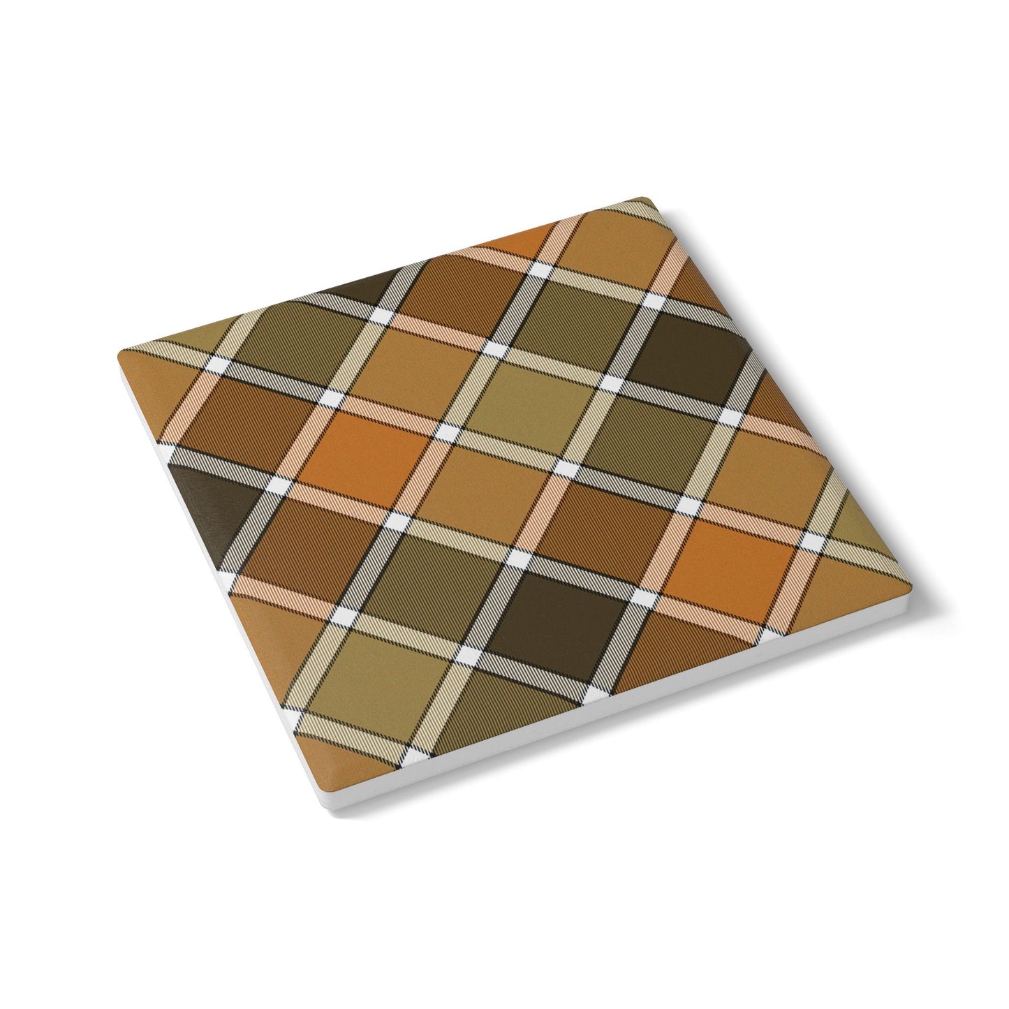 Fall colored plaid patterned ceramic tile coaster on a white background
