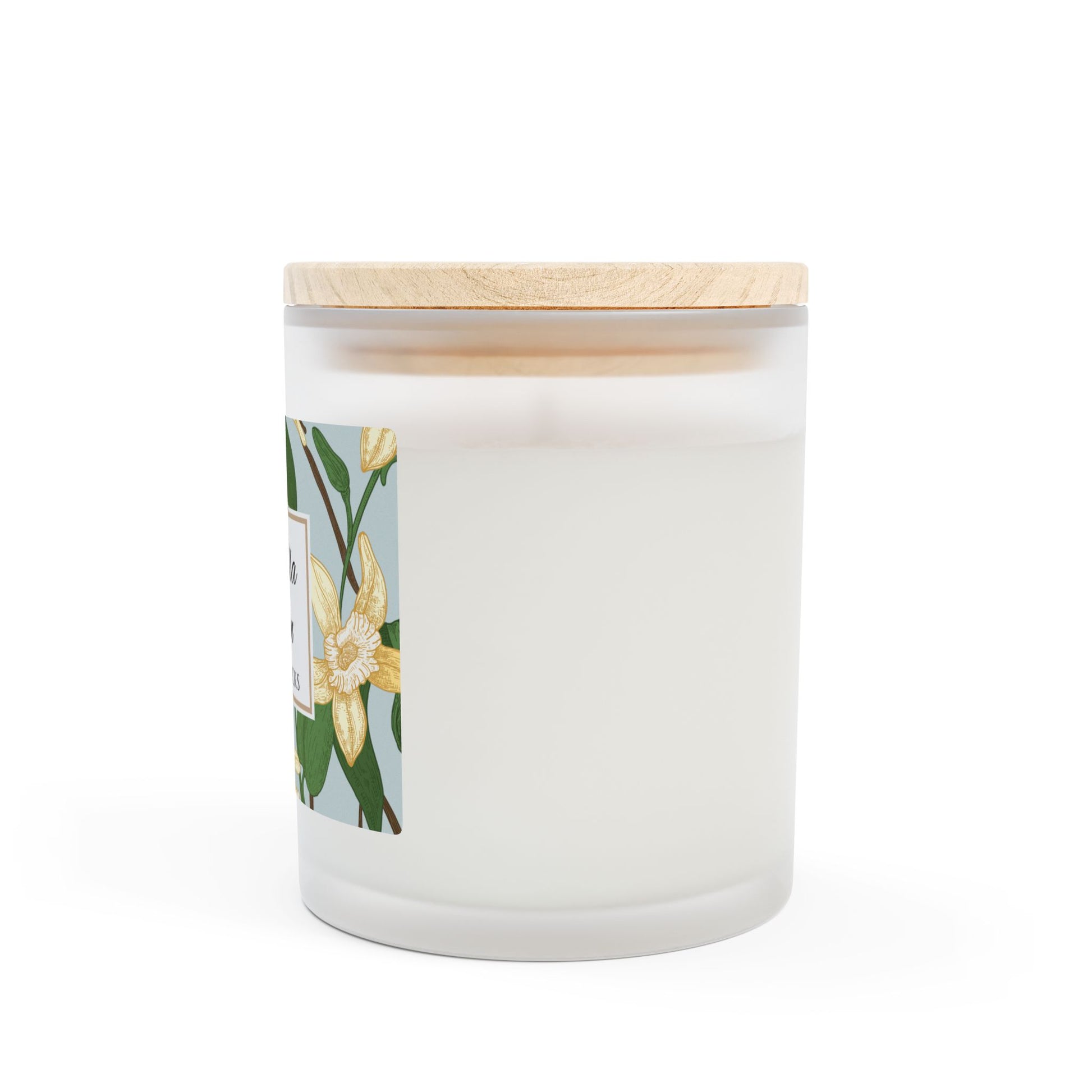 White candle with wooden lid and floral label on a white background