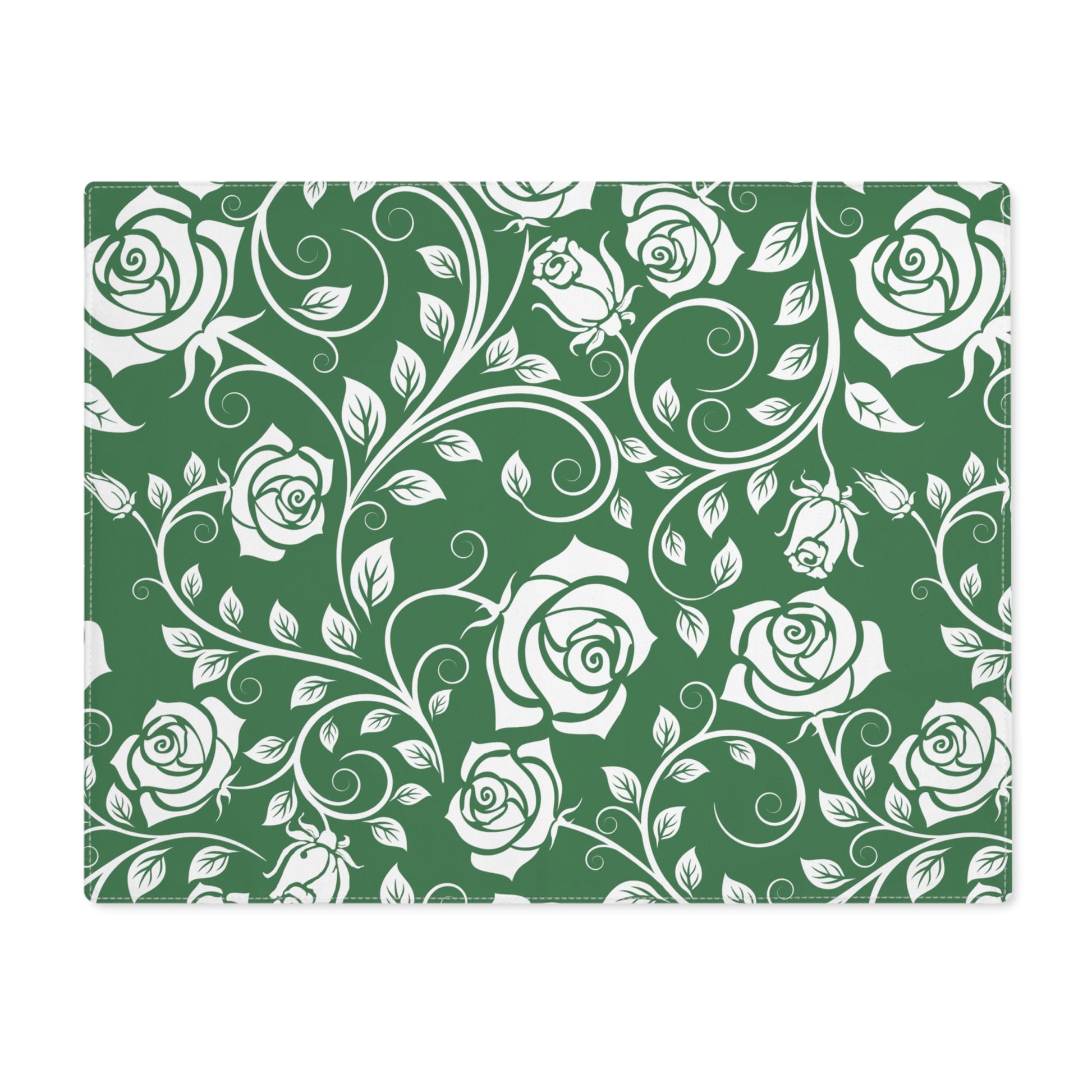 Green and white floral patterned placemat on white background