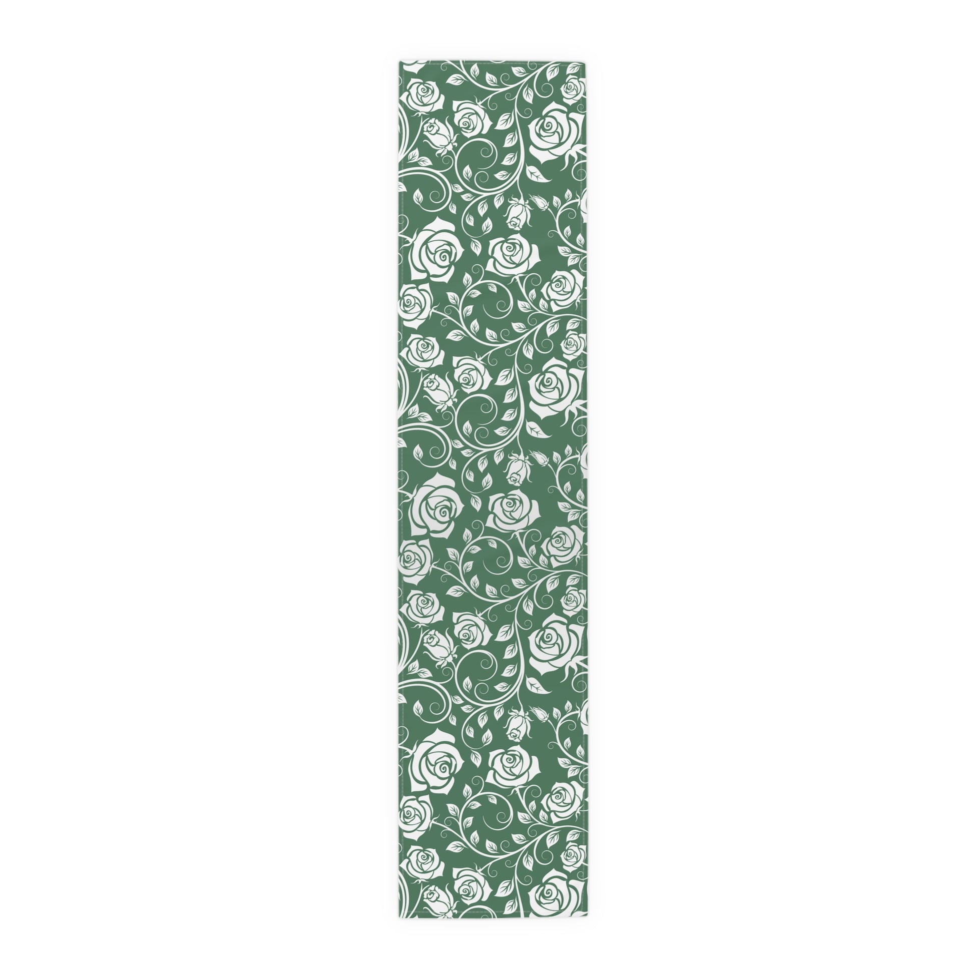 Table runner with green and white floral pattern on a green background on a white background