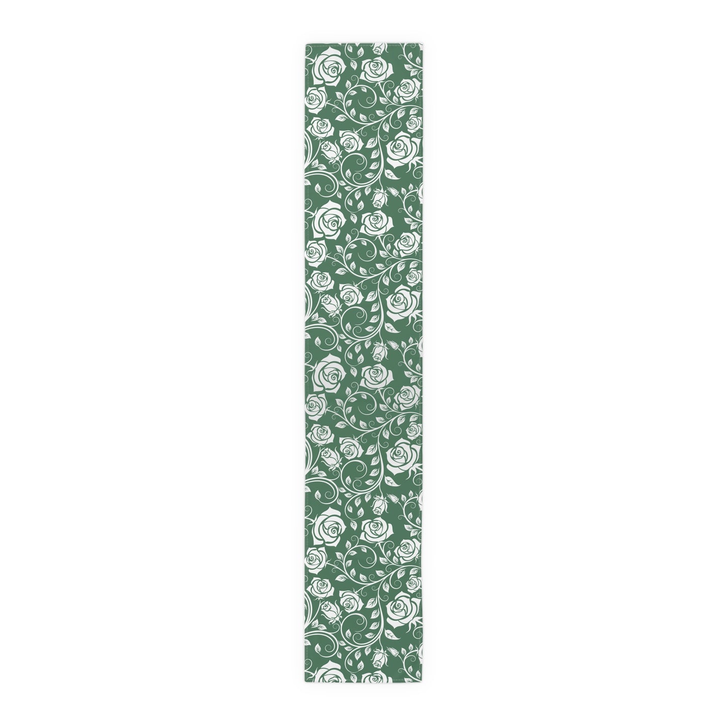 Green and white floral patterned table runner on a white background