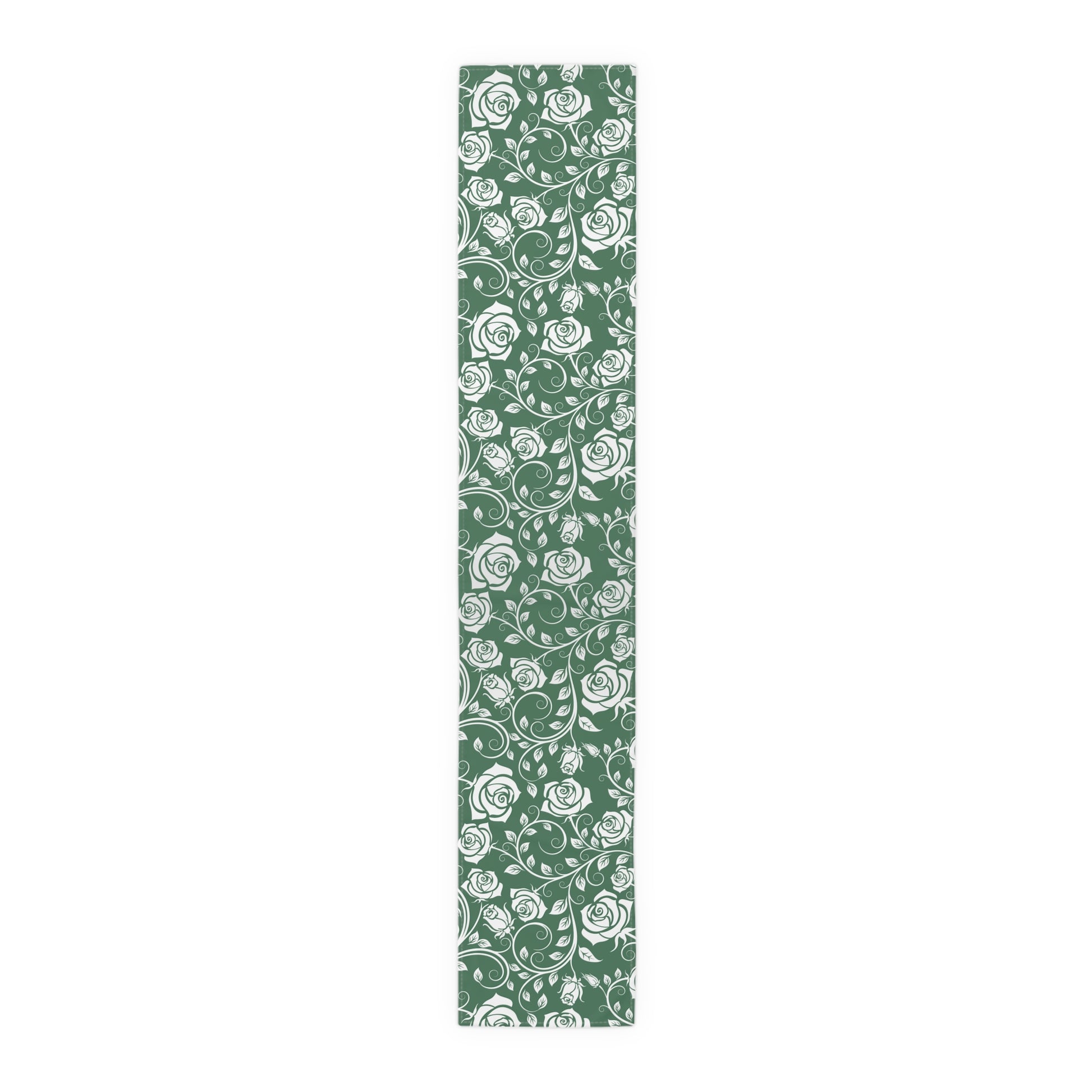Green and white floral patterned table runner on a white background