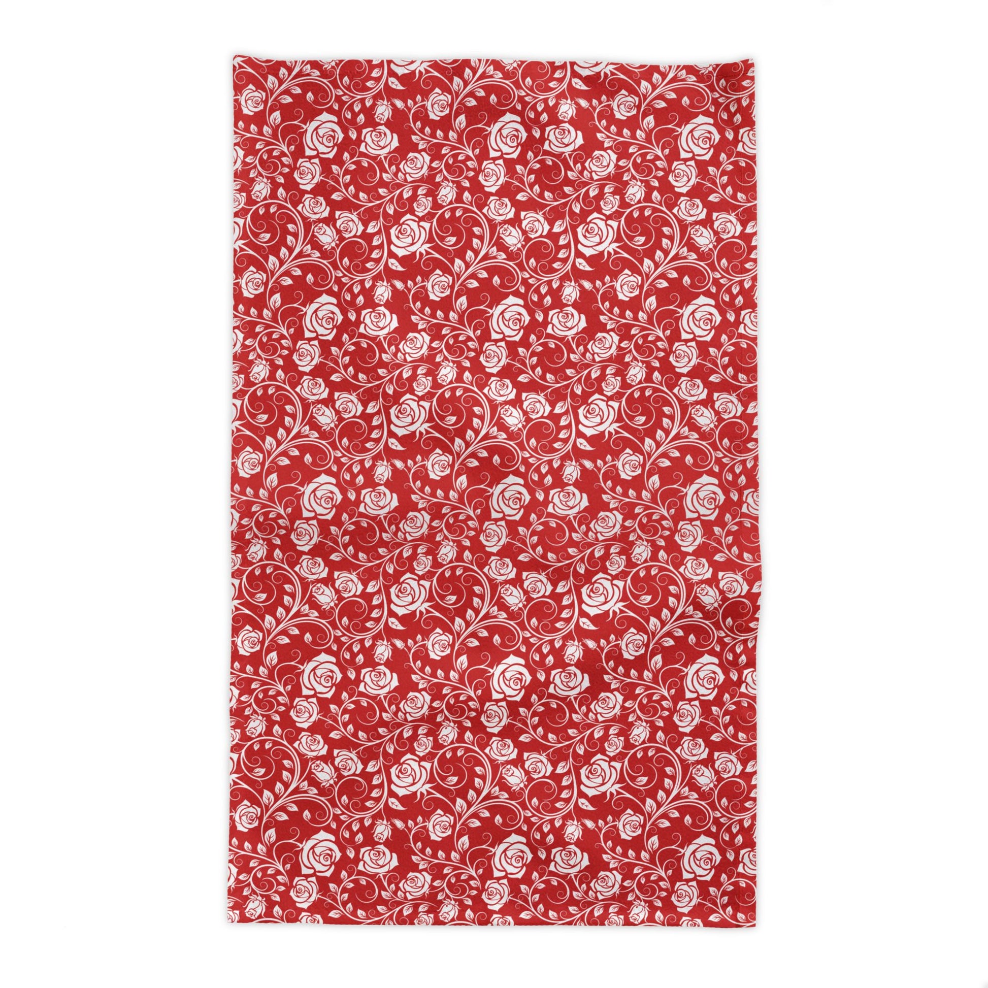 Red rectangle tablecloth with white floral pattern on a white background