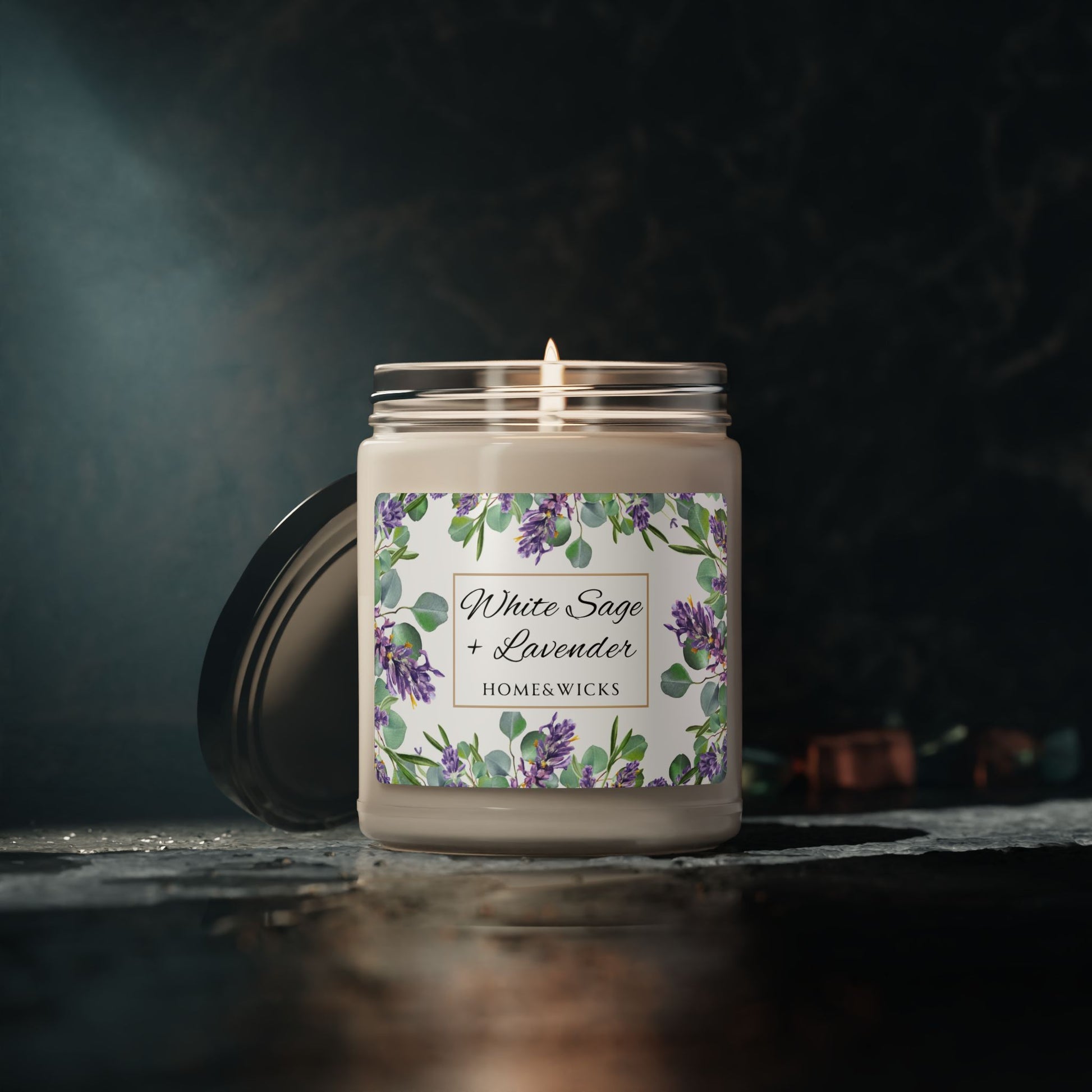 Home and wikes candle with a floral label on a dark background
