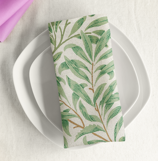 Willow Boughs 22 x 22 Napkin with green leaf willow branch pattern on a white plate