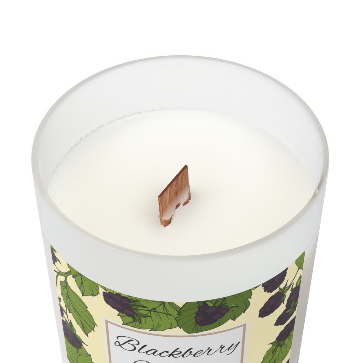 Wood wick Blackberry Vanilla candle with a label featuring blackberries and leaves image on a white background by Home & Wicks