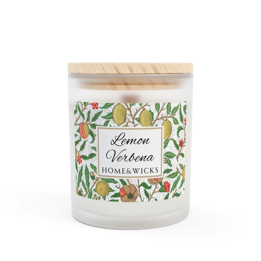 Candle with 'Lemon Verbena' label and 'Home & Wicks' branding on a white background that features the illustration by William Morris "Fruit"