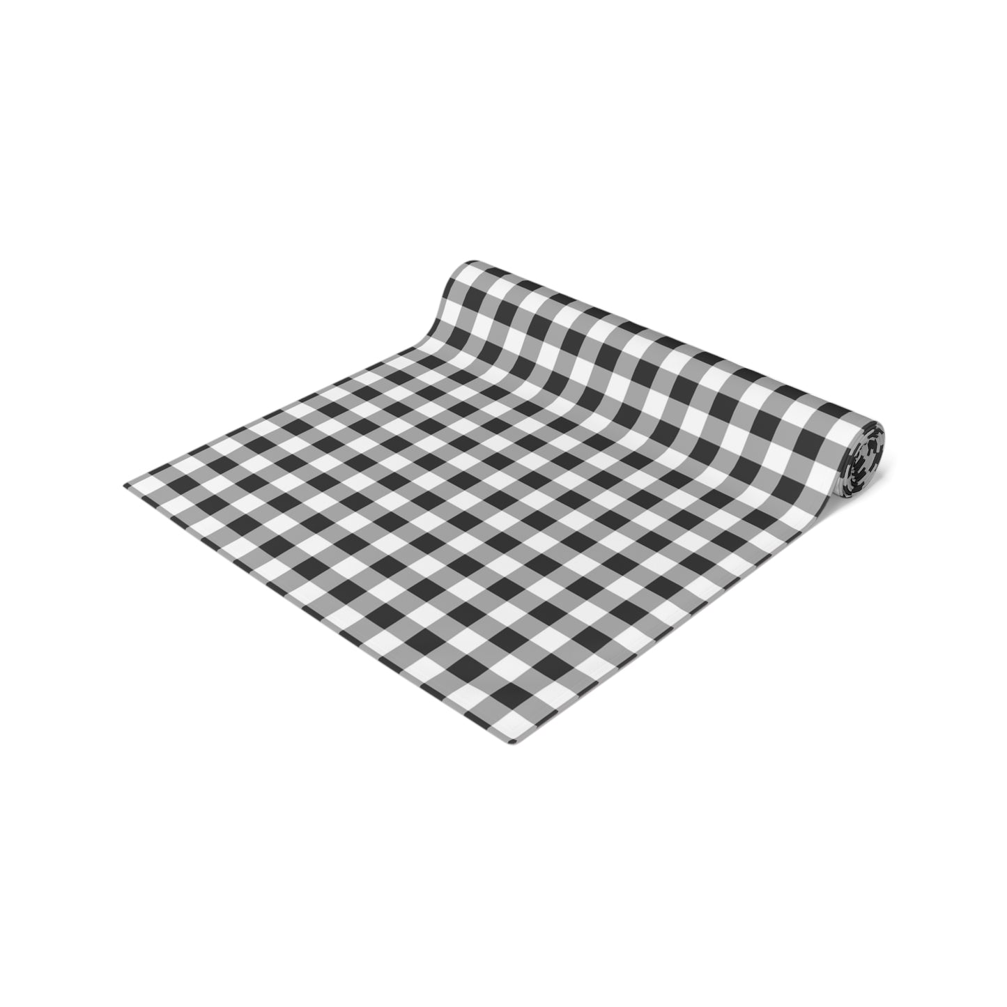 Rolled up black and white checkered gingham table runner on a white background