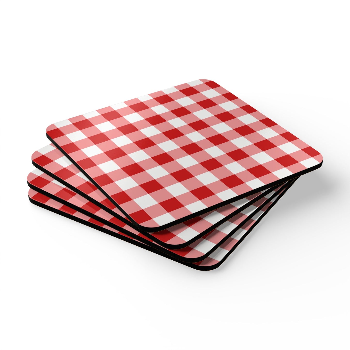 Set of four red and white gingham checkered coasters on a white background