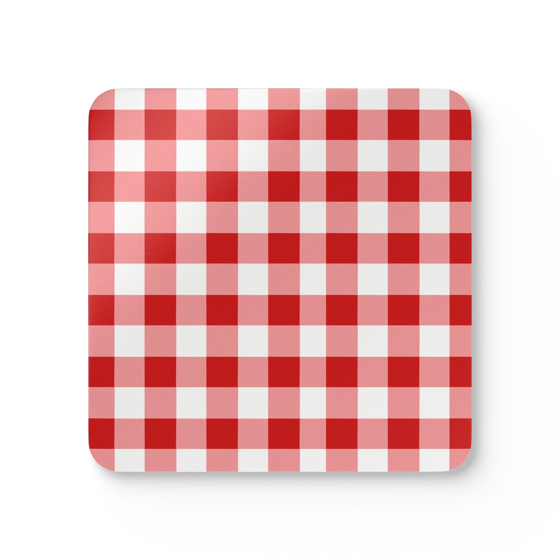 Red and white gingham checkered coaster on a white background